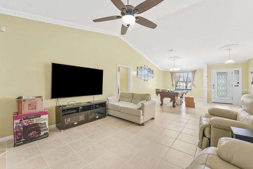 Private Florida resort-style brick home with screened pool - photo 16