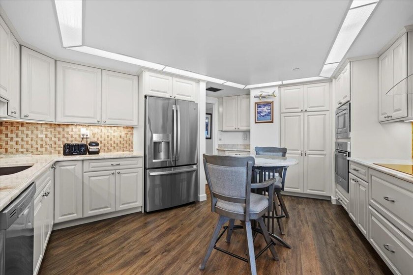 Experience refined coastal living in this beautifully updated - photo 6