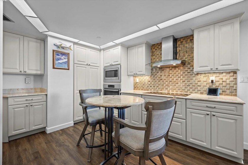 Experience refined coastal living in this beautifully updated - photo 9