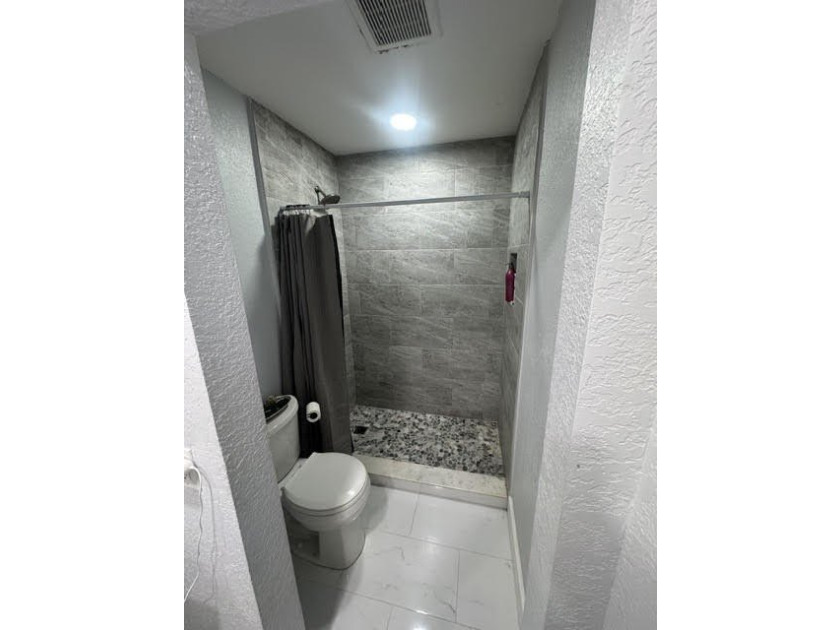 Welcome to this charming two-bedroom, one-and-a-half-bath - photo 12