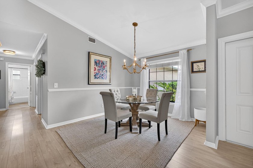 This beautifully renovated home offers modern upgrades, timeless - photo 6