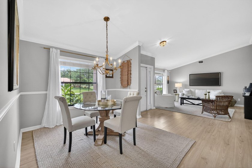 This beautifully renovated home offers modern upgrades, timeless - photo 7