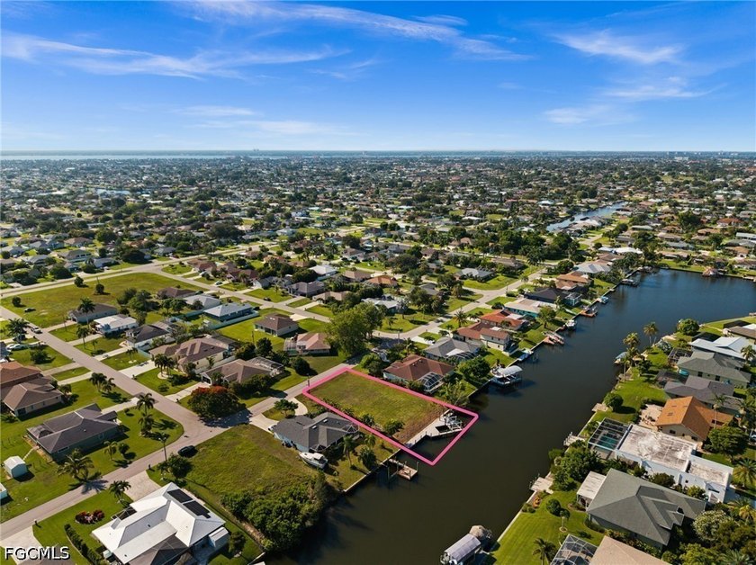 GULF ACCESS LOT WITH A NEWER SEAWALL, DOCK, CAPTAIN'S WALK, AND - photo 3