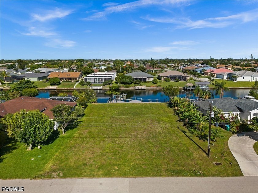 GULF ACCESS LOT WITH A NEWER SEAWALL, DOCK, CAPTAIN'S WALK, AND - photo 6