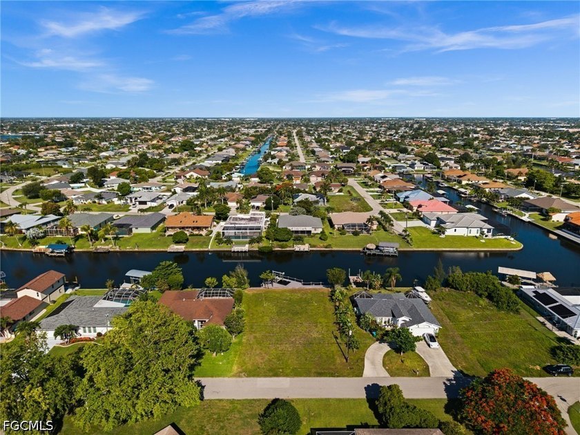 GULF ACCESS LOT WITH A NEWER SEAWALL, DOCK, CAPTAIN'S WALK, AND - photo 7