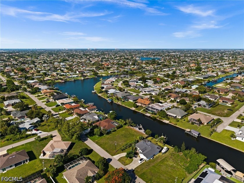 GULF ACCESS LOT WITH A NEWER SEAWALL, DOCK, CAPTAIN'S WALK, AND - photo 9