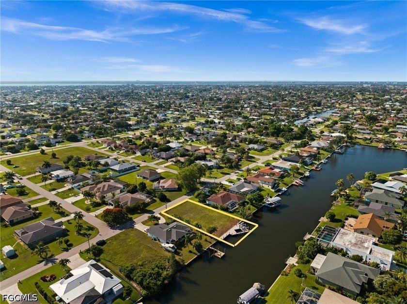 GULF ACCESS LOT WITH A NEWER SEAWALL, DOCK, CAPTAIN'S WALK, AND - photo 10