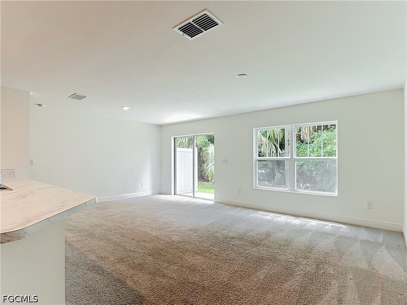 lowest priced 3 bedroom 2.5 bath, home in Bayshore Commons. This - photo 8