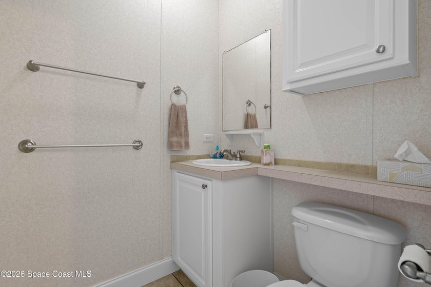 Spacious four-bedroom, three-bath home featuring a versatile - photo 21