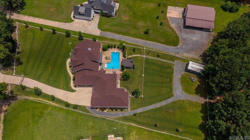 Nestled on nearly two private acres this one-of-a-kind estate - photo 3