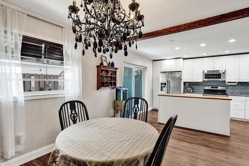 An updated and spacious corner villa in Forest Lake community at - photo 20