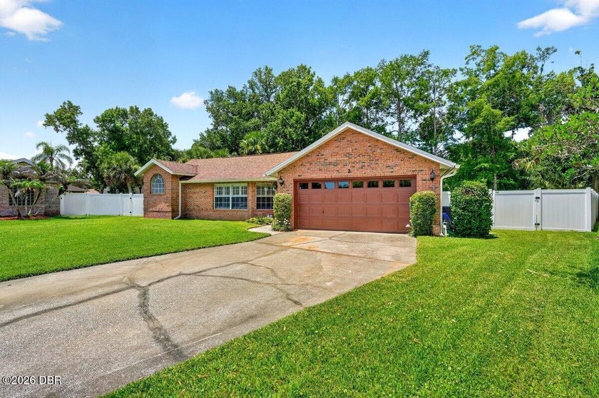 Located at the end of a quiet cul-de-sac with mature landscaping - photo 2