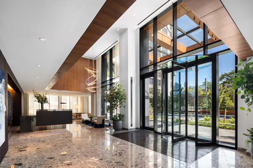 Welcome to Quay Tower, an exceptional waterfront residence in - photo 9