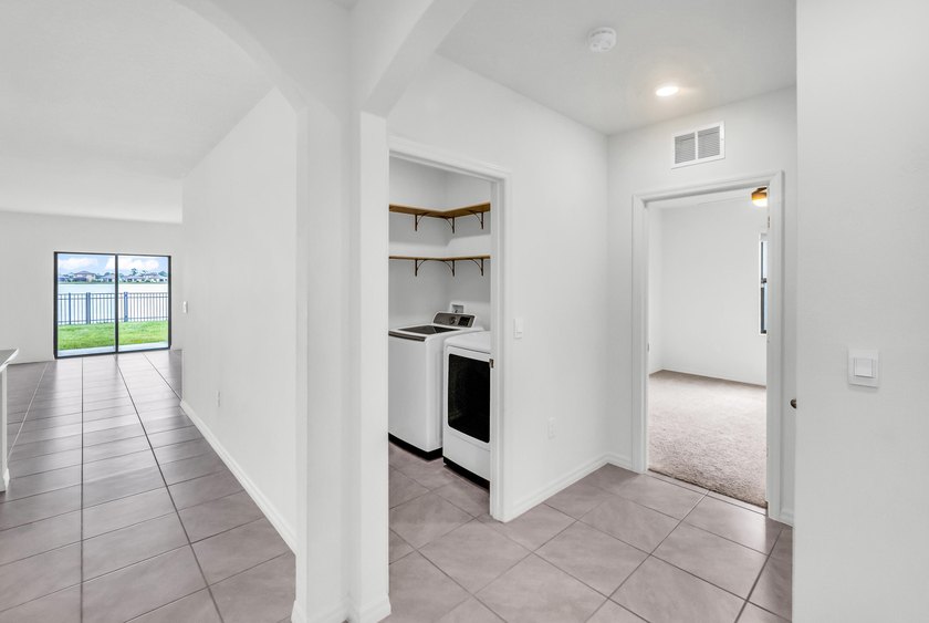 Discover WATERFRONT living in Cypress Bay Preserve! BUILT IN - photo 14