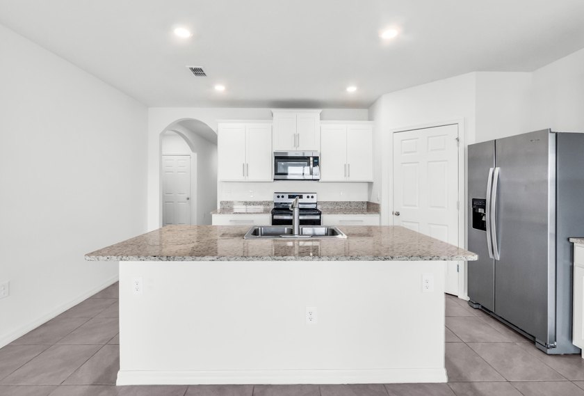 Discover WATERFRONT living in Cypress Bay Preserve! BUILT IN - photo 24