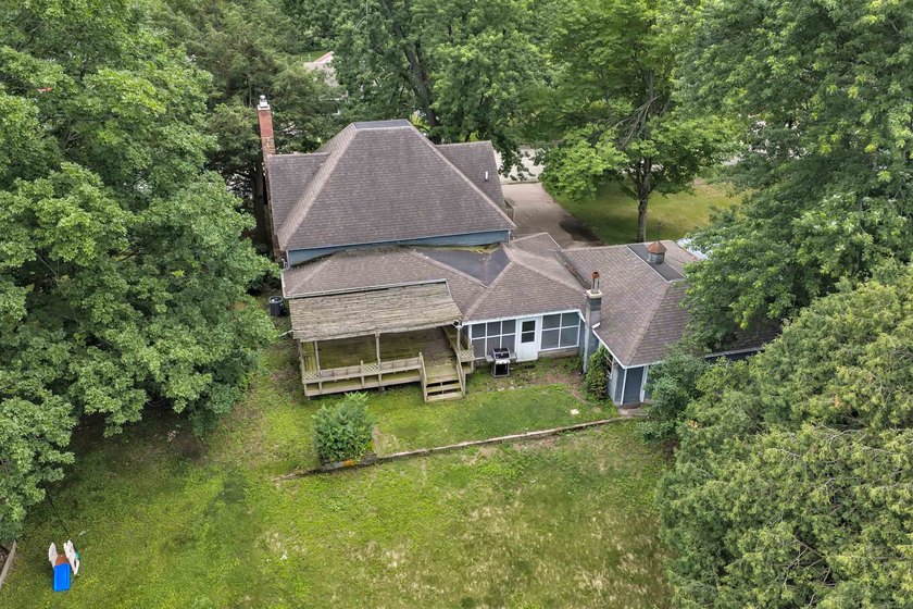 This charming 4-bedroom, 1-bath home is located in a quiet - photo 2