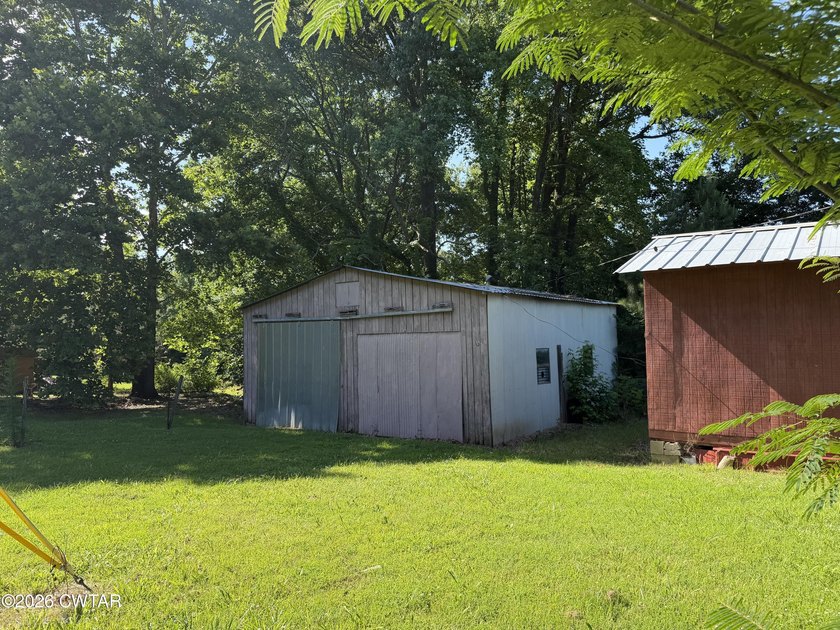 Check out this 3 bedroom, ranch-style home with a barn, shop - photo 11