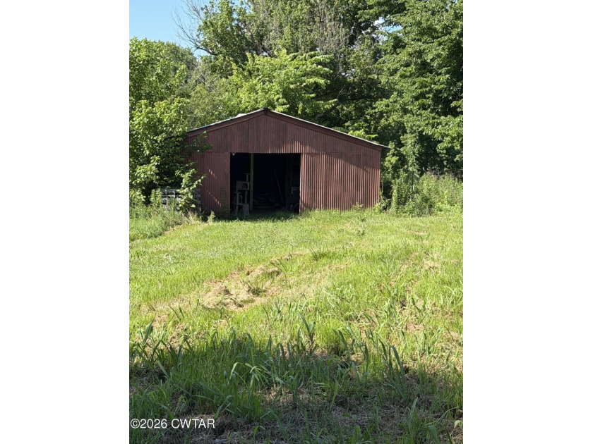 Check out this 3 bedroom, ranch-style home with a barn, shop - photo 14