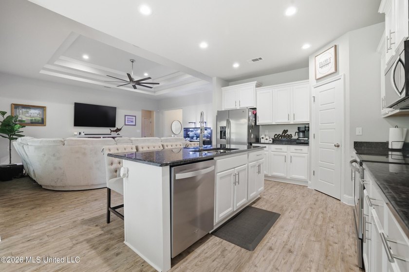 This home has it all! Featuring a spacious open floor plan, this - photo 18