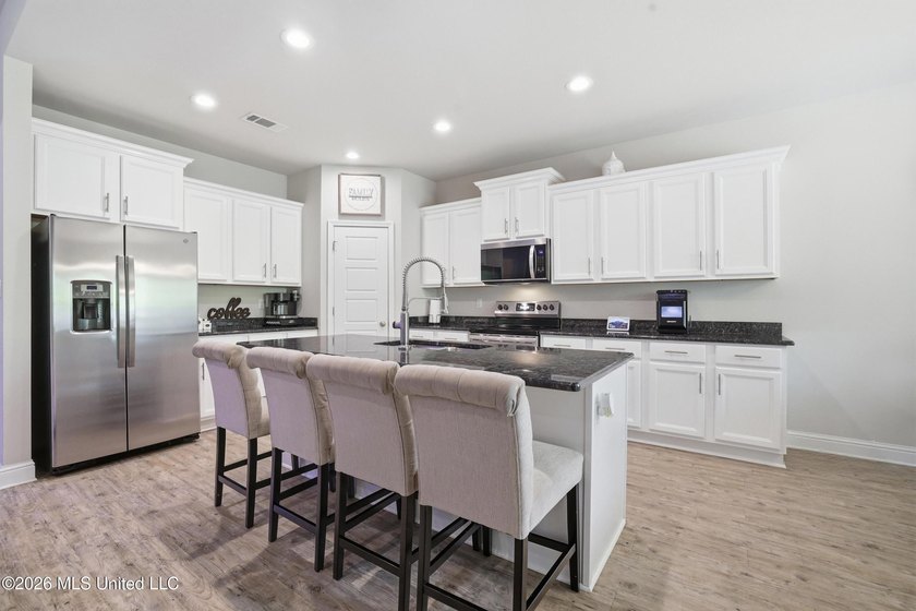 This home has it all! Featuring a spacious open floor plan, this - photo 19