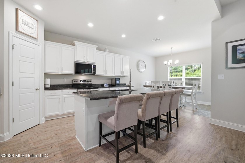 This home has it all! Featuring a spacious open floor plan, this - photo 21