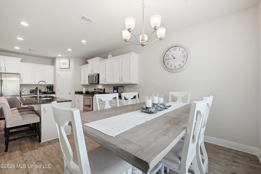 This home has it all! Featuring a spacious open floor plan, this - photo 22