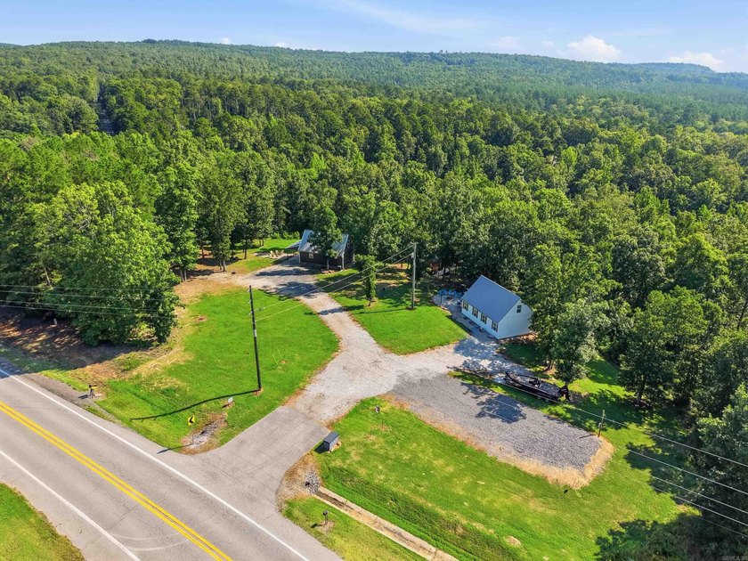 Such an adorable retreat sitting on 12.60 acres +/- with 3 Cozy - photo 2