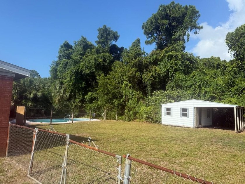 Move-in ready 1965 3 BR/1BA unfurnished 1064 sq ft brick home - photo 3