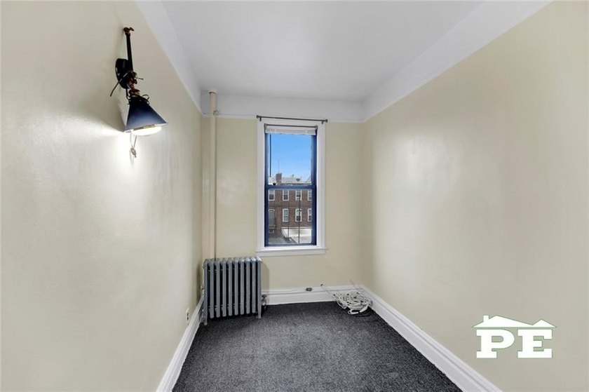 Welcome to 1392 Troy Avenue, a solid brick two-family home in - photo 22