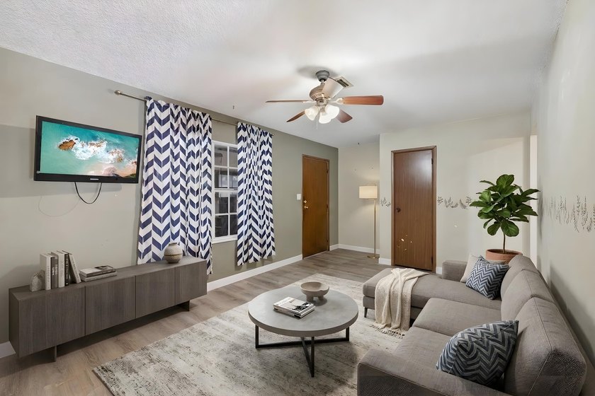 This inviting 2-bedroom, 2-bath Lakewood Park home blends - photo 2