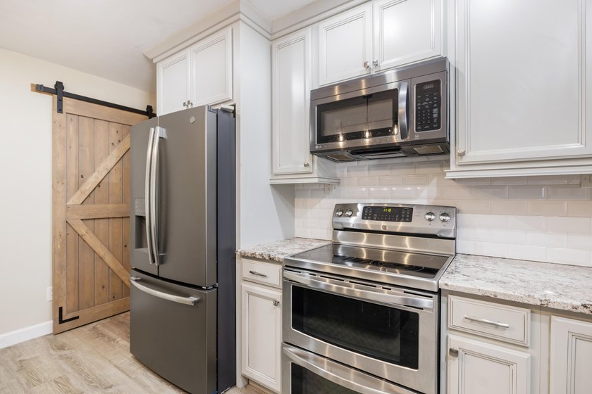 This inviting 2-bedroom, 2-bath Lakewood Park home blends - photo 10