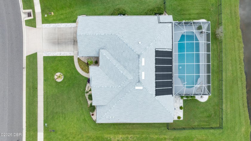 POOL HOME ON THE LAKE! Beautifully maintained and extensively - photo 4