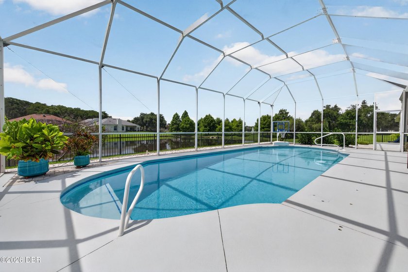 POOL HOME ON THE LAKE! Beautifully maintained and extensively - photo 8