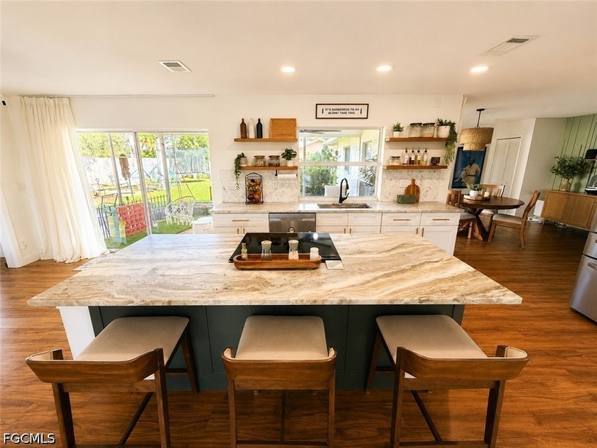 Welcome to this beautifully updated 4BR, 2BA with 2 car garage - photo 6