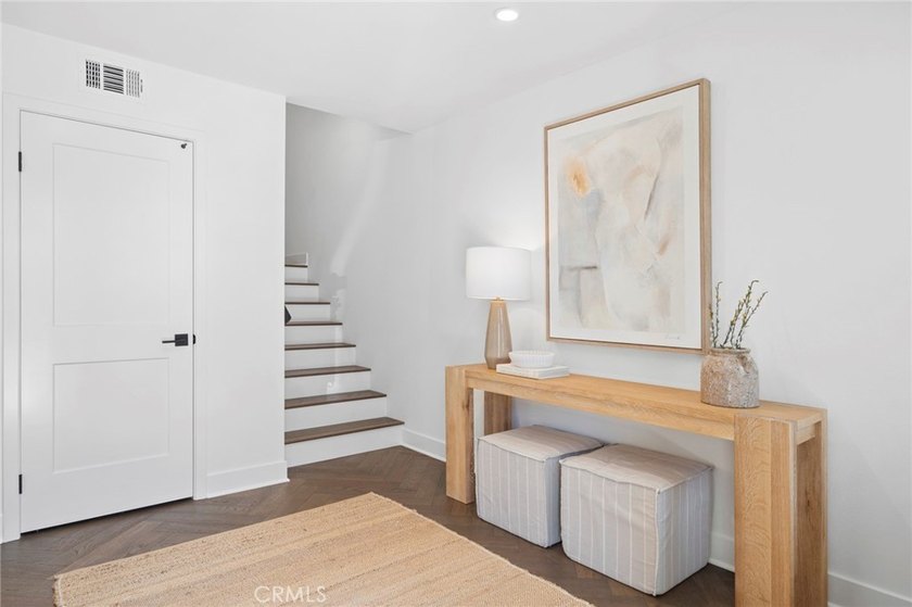 Rarely available, this exceptional 3-bedroom, 2.5-bath end-unit - photo 3