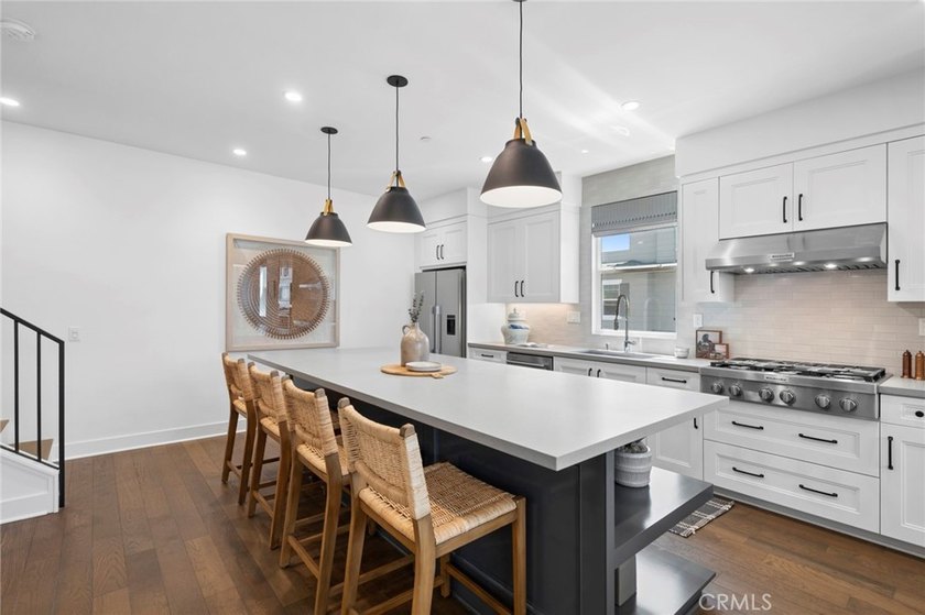Rarely available, this exceptional 3-bedroom, 2.5-bath end-unit - photo 6