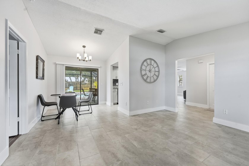 Welcome to this freshly painted 2-bedroom, 2-bathroom pool home - photo 3