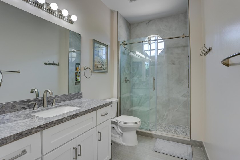 Rarely available Lake Front pool home in a GL Homes gated - photo 32