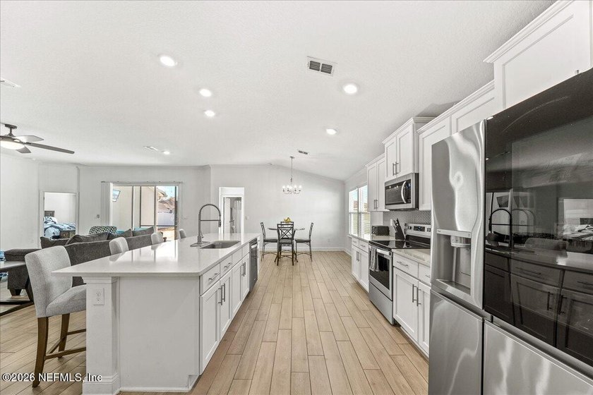 Impeccably clean, bright, &amp; beautifully open, this newer POOL - photo 8