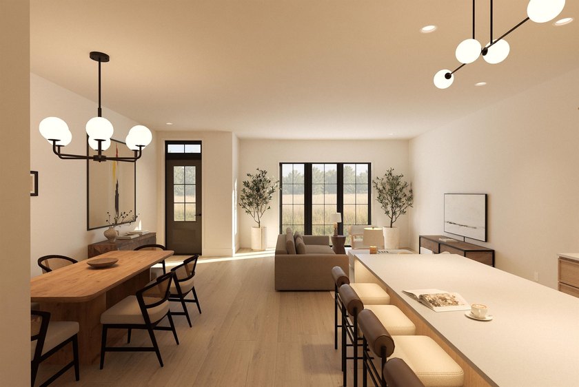 Experience elevated townhome living in downtown Goshen. The - photo 3