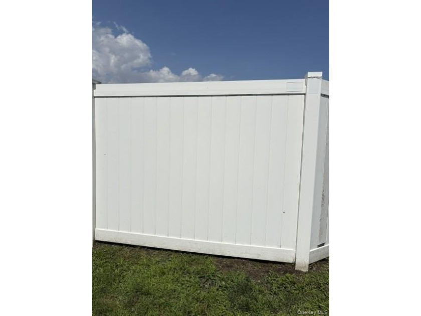 This compact, fully fenced lot offers a secure and practical - photo 4