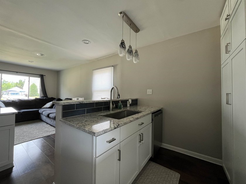 Beautifully updated and move-in ready, this charming 2 bed, 1 - photo 7