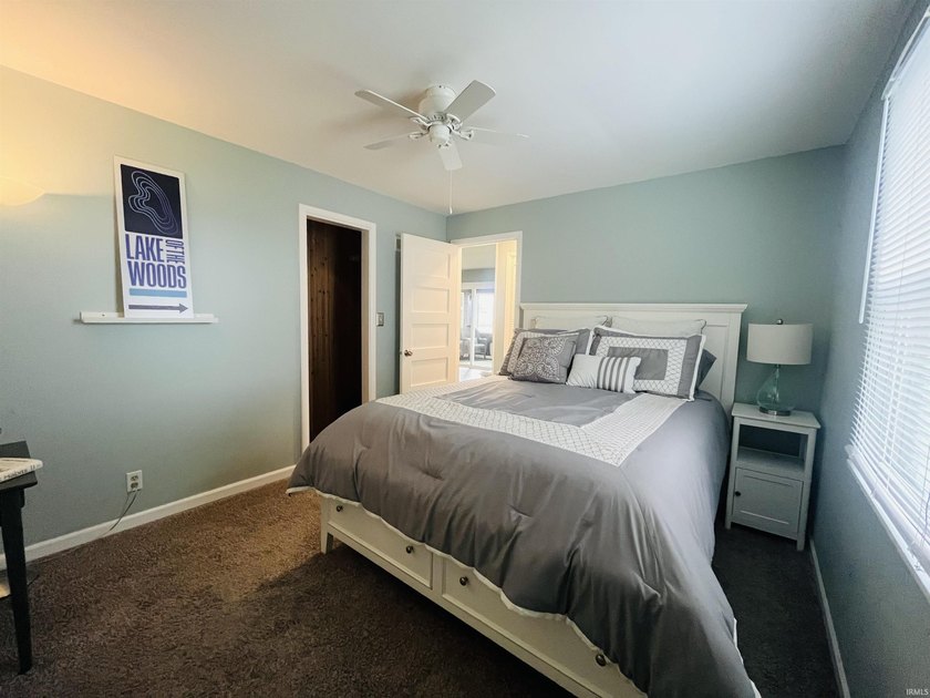 Enjoy the best of lake living in this charming 2-bedroom 1.5 - photo 8