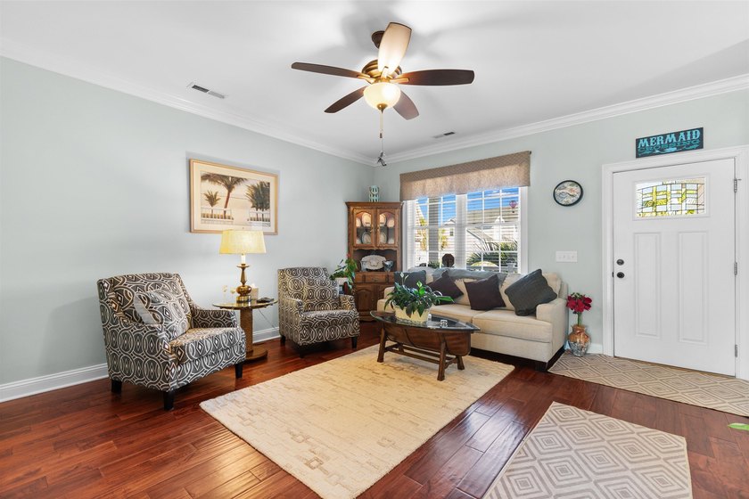 This spacious 4-bedroom, 3-bath home offers a versatile open - photo 12
