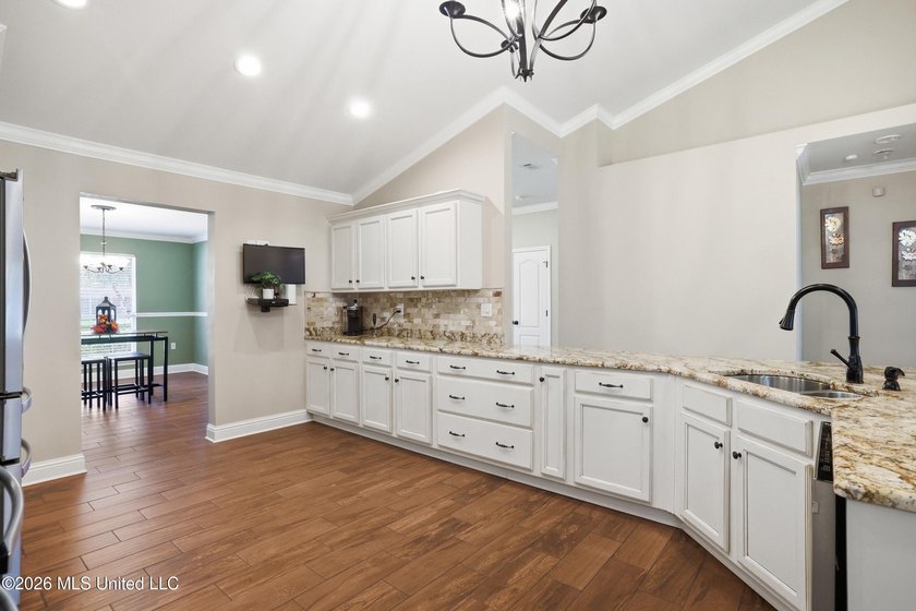 Step into this beautifully renovated home where modern updates - photo 13