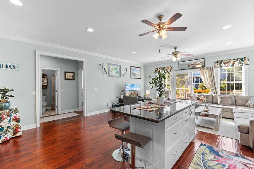 This spacious 4-bedroom, 3-bath home offers a versatile open - photo 16