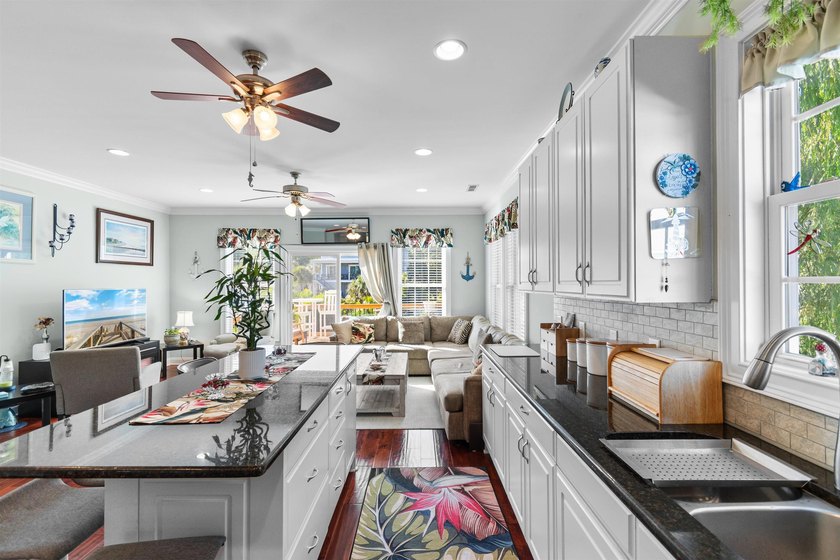 This spacious 4-bedroom, 3-bath home offers a versatile open - photo 17