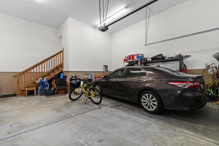 This spacious 4-bedroom, 3-bath home offers a versatile open - photo 26