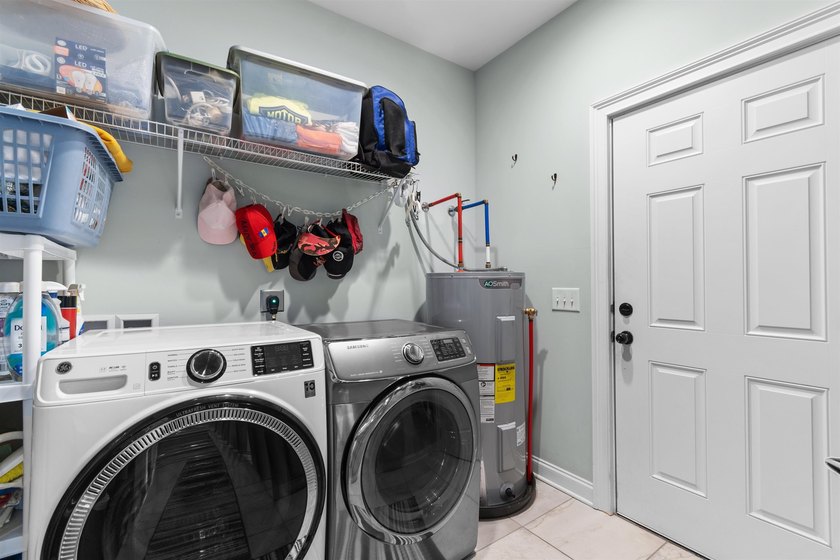 This spacious 4-bedroom, 3-bath home offers a versatile open - photo 27