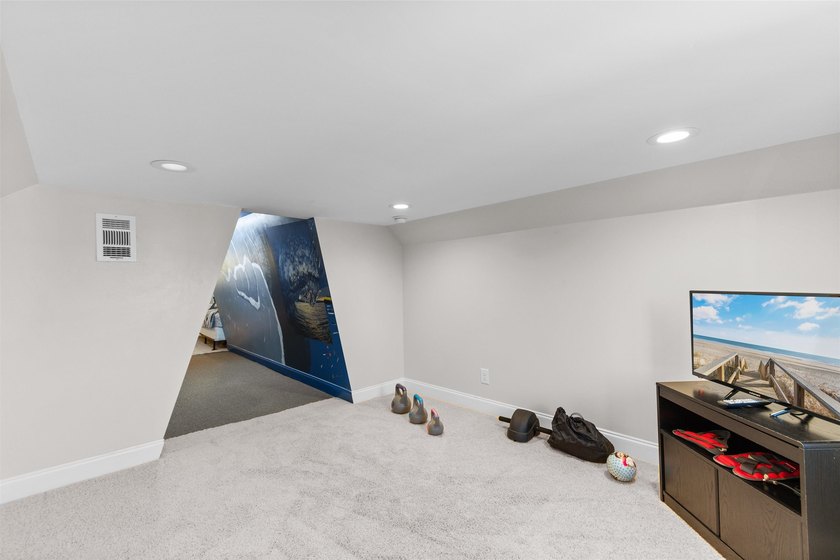 This spacious 4-bedroom, 3-bath home offers a versatile open - photo 28